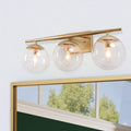 KSANA Gold Vanity Light,3 Modern Bathroom Fixture with Clear Globe Glass Shades and Taper Arm
