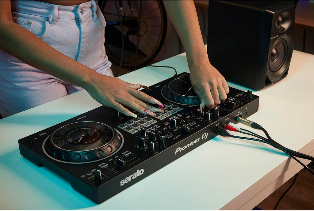 Pioneer DDJ-REV1 DJ Controller Bundle with Adjustable Laptop Stand for DJ's, Monitoring Headphones and StreamEye Polishing Cloth