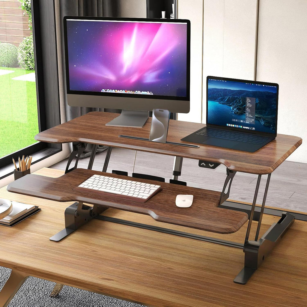 Mount-It! Electric Standing Desk Converter with 38' Tabletop, Height Adjustable Desk Riser, Motorized Desk Riser with Keyboard Tray and Device Slot, Fits Monitor & Laptop, Dark Walnut