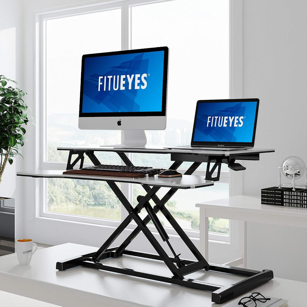 FITUEYES Height Adjustable Standing Desk 32' Wide Sit to Stand Converter Stand Up Desk Tabletop Workstation for Laptops Dual Monitor Riser White SD308003WW